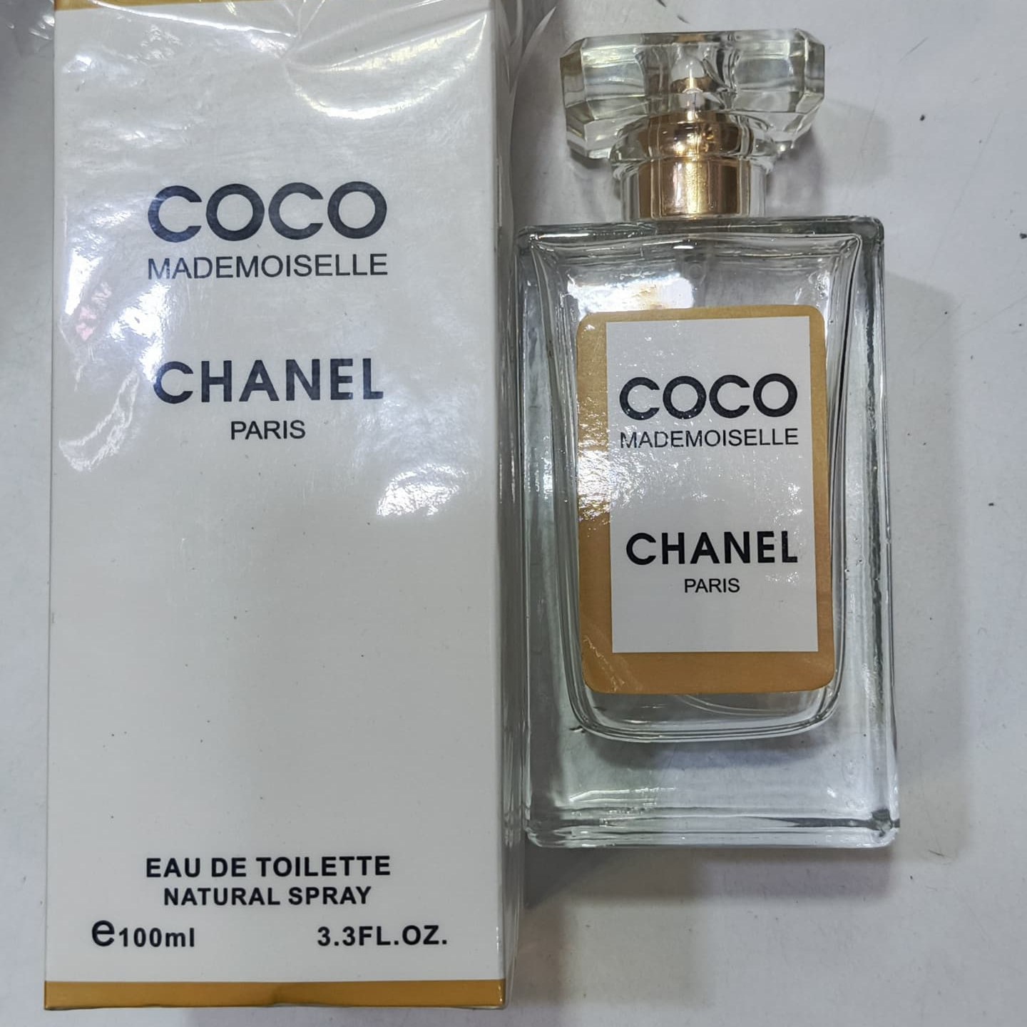 WhatsApp-Image-2025-05-05-at-4.24.48-PM-2.jpeg COCO MADEMOISELLE Chanel Eau de Parfum 3.4 oz amber bottle front view