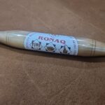 Gujrati slim wooden rolling pin on white background