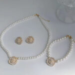 Elegant pearl flower necklace and earrings set