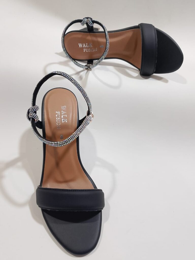 Black block heel sandal with sparkling rhinestone T-strap side view