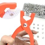Tich snap button plier with 25 plastic buttons on table