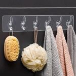 6-in-1 heavy-duty transparent self-adhesive wall hooks on white background