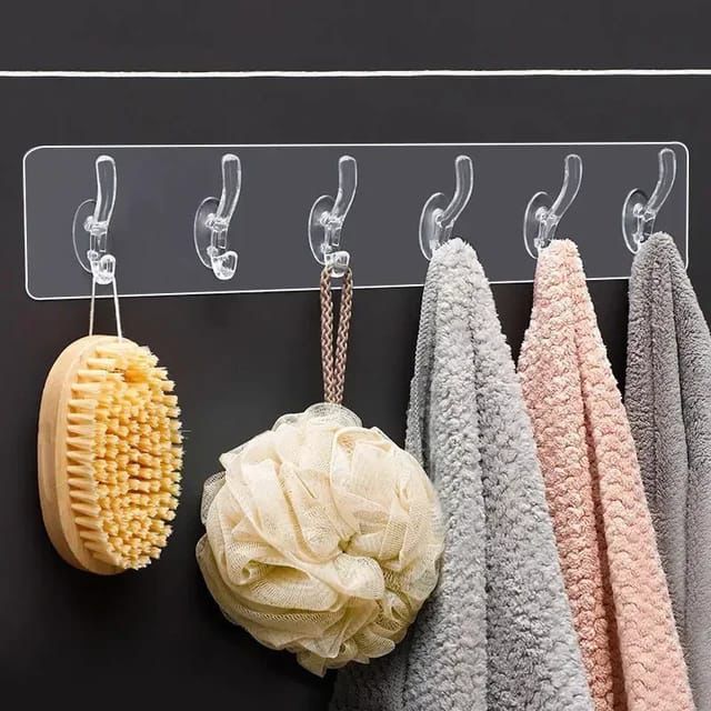 WhatsAppImage2024-10-01at13.42.02_1728911435.jpg 6-in-1 heavy-duty transparent self-adhesive wall hooks on white background