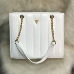Guess handbag 13x11 inches with gold chain strap and stitched panels