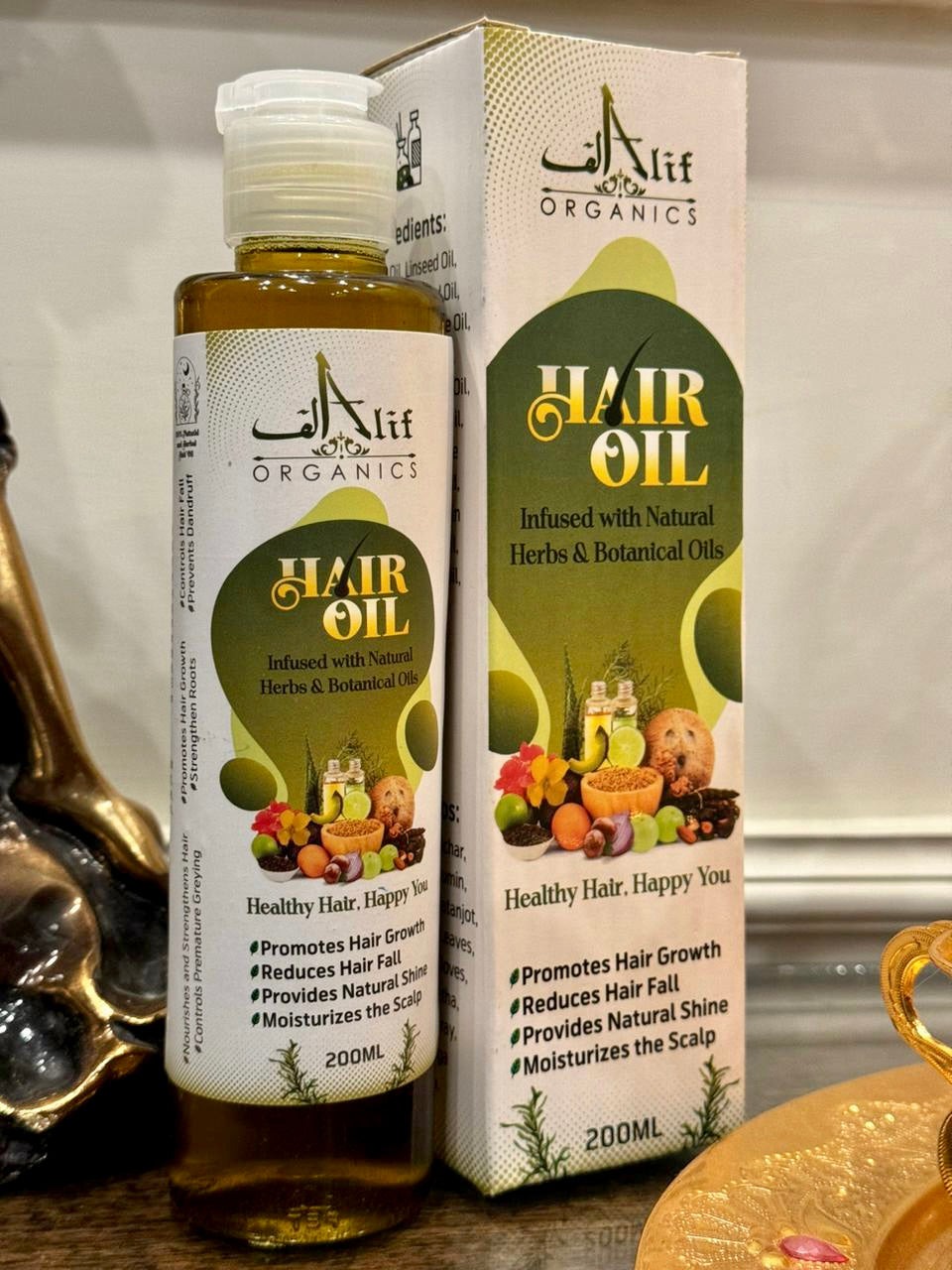b9c22e4a7213c3347cf01bcdf8e9f586.jpg Alif Organics Natural Hair Oil 200ML bottle front view