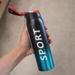 500 ml stainless steel double wall vacuum flask with straw on white background