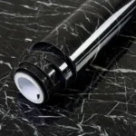 Black and white marble sheet sticker on kitchen cupboard