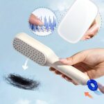 Self-cleaning hair brush with one-click cleaning and telescopic comb in assorted color